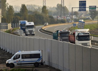 Anti-intrusion’ wall built in Calais to stop migrants from jumping on UK-bound trucks