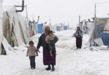 REPORT : Fango e fumo – l’inverno nei campi profughi