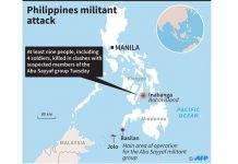 9 dead as Philippine troops battle extremists in tourist island
