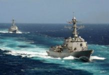 US fires warning shots to stop Iran navy vessel in Gulf
