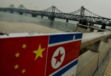 China suspends North Korean iron, seafood imports