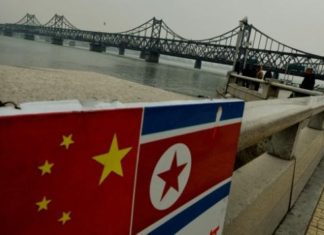 China suspends North Korean iron, seafood imports