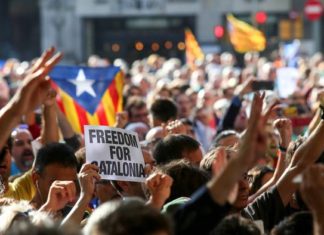 Spanish police storm Catalan government buildings to stop independence referendum