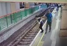 VIDEO – Hong Kong train station : man pushing woman on rail track