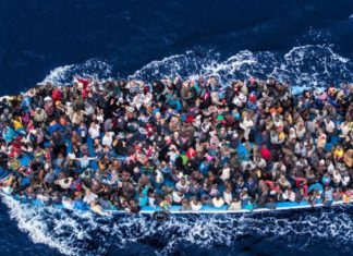 AU estimates at least 400000 African migrants now in Libya