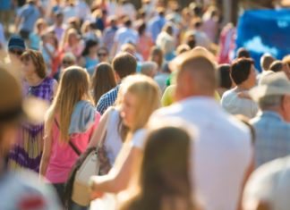 Why Do We Trust, or Distrust Strangers? The Answer is Pavlovian