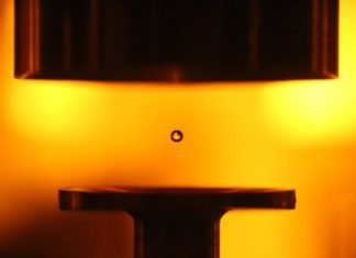 Levitating water droplets with sound waves to improve contaminant detection