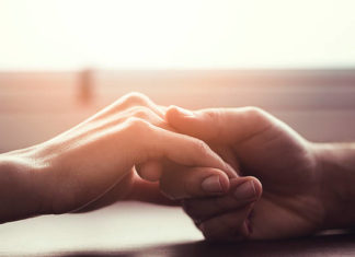 Researchers report couples who frequently hug or hold hands have lower cortisol levels, have decreased symptoms of physical problems and sleep better