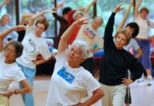 Adults in their early 60s, who spend less time sitting and more time engaged in light to vigorous physical activity, benefit with healthier levels of heart and vessel disease markers
