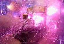 Record indoor magnetic field of 1200 T generated by electromagnetic flux-compression