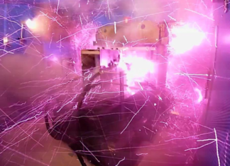 Record indoor magnetic field of 1200 T generated by electromagnetic flux-compression