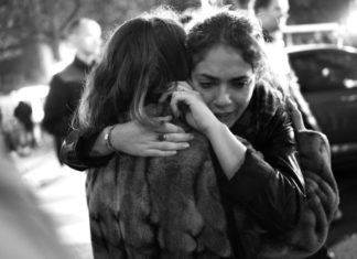 Receiving hugs may buffer against deleterious changes in mood associated with interpersonal conflict