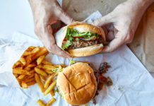 Seeing pictures of food with calorie information not only makes food less appetizing but it also appears to change the way your brain responds to the food