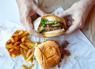 Seeing pictures of food with calorie information not only makes food less appetizing but it also appears to change the way your brain responds to the food