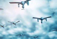 Autonomous Multi-Domain Adaptive Swarms-of-Swarms (AMASS): A Game-Changer in Countering Anti-Access/Area-Denial (A2/AD) Systems