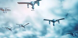 Autonomous Multi-Domain Adaptive Swarms-of-Swarms (AMASS): A Game-Changer in Countering Anti-Access/Area-Denial (A2/AD) Systems