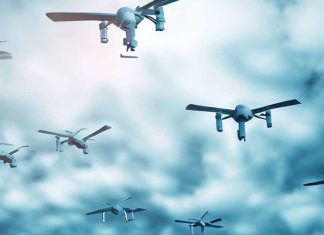 Autonomous Multi-Domain Adaptive Swarms-of-Swarms (AMASS): A Game-Changer in Countering Anti-Access/Area-Denial (A2/AD) Systems